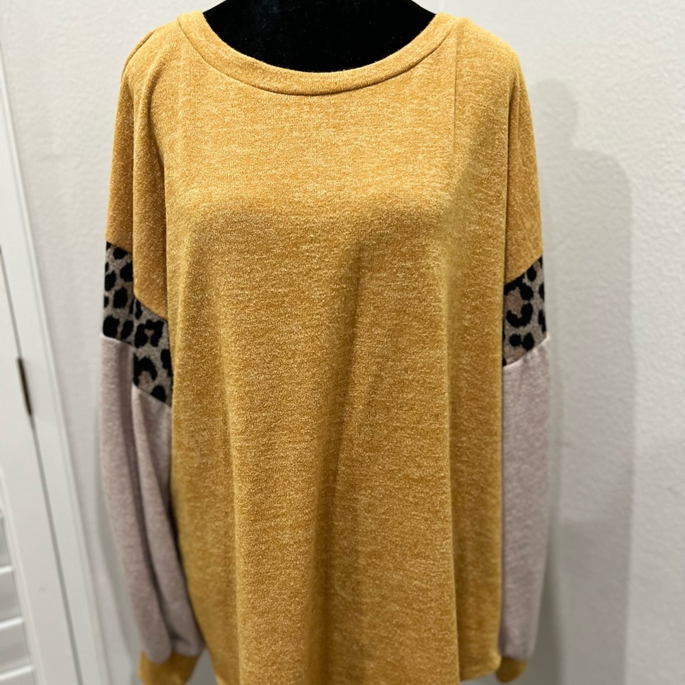 Casual sweater type top purchased at a boutique